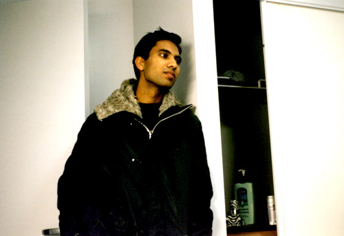 Nabeel standing in my room in UW Place.