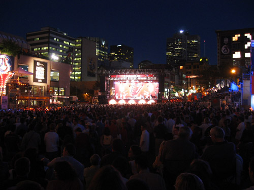 A crowd at the Montreal Jazz Festival watching Kokolo play.