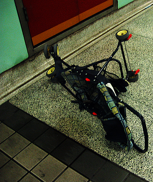 A pram on its side in St. Patrick station.