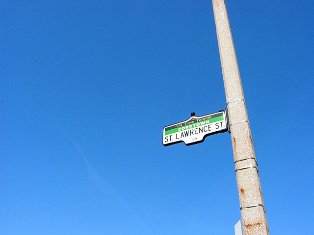 A sign post identifies this street as being in Corktown.
