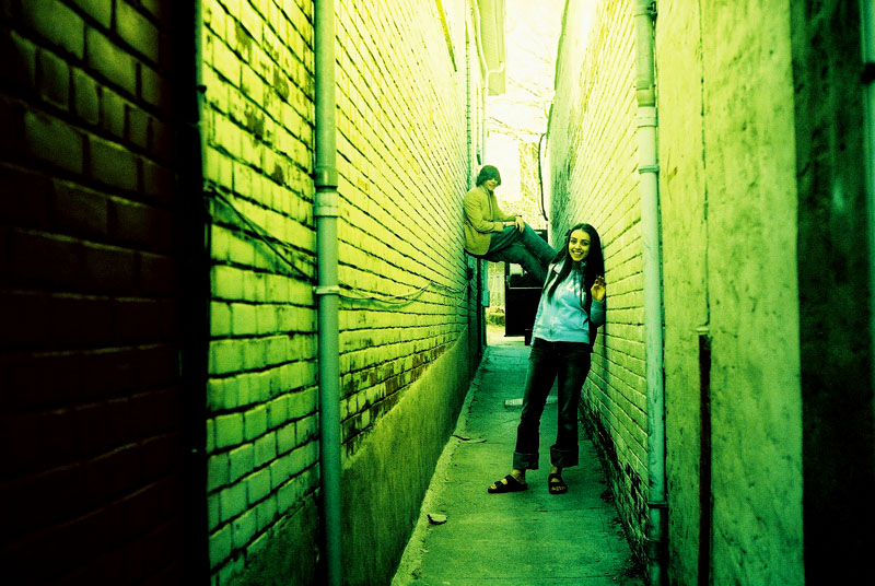 Tyler and Shima in an Alley.