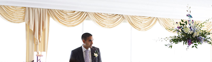 Ravi gives a speech during Rishi's wedding.