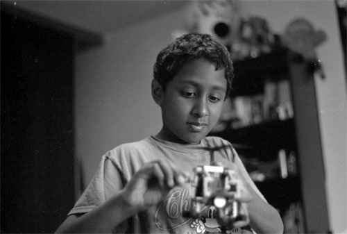 Krishna holding a Lego helicopter.