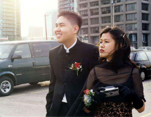 Crystal and Victor waiting to board a boat for our formal in OAC.