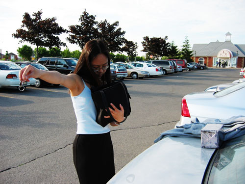 Martha in the parking lot of Market Village