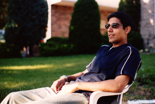 Rishi sitting in front of my house.