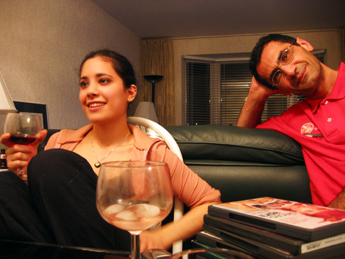 Nina and Riadh sitting in Riadh's dining room.