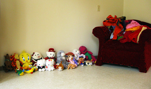 Hasha's teddy bears on the living room floor of her home.