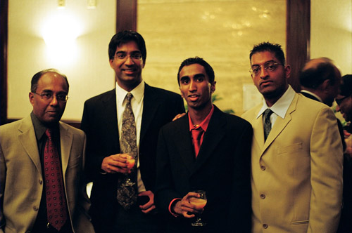 My dad, Mahi, Ahilan and Gajan at my cousin Arjuna's wedding reception.