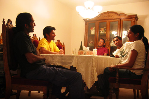 My cousins at my dining room table.