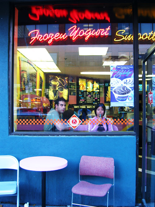 Carvill and Mez eating frozen yogurt in the gay district.