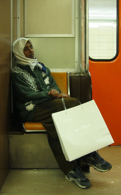 A lady sitting across from me on the subway.