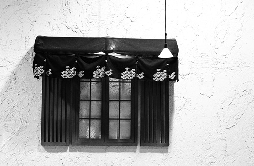 A window inside the Korean BBQ restaurant at Midland and Finch.