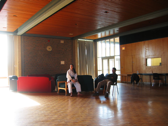 Shima and Riadh sitting in the great hall in Village 1.