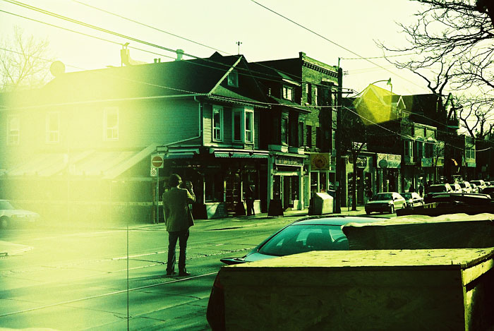 Tyler standing in the middle of Queen St.
