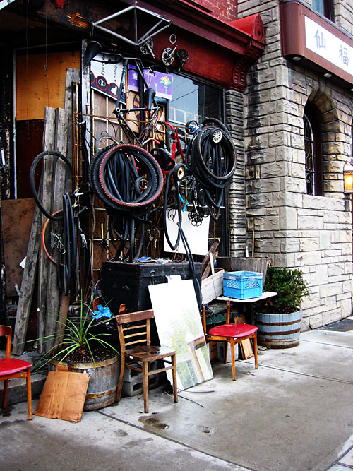 A bicycle repair shop next to Clafouti.