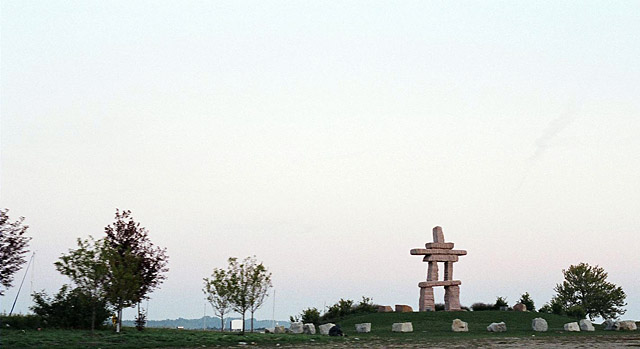 A man made out of stone along the Gardiner.