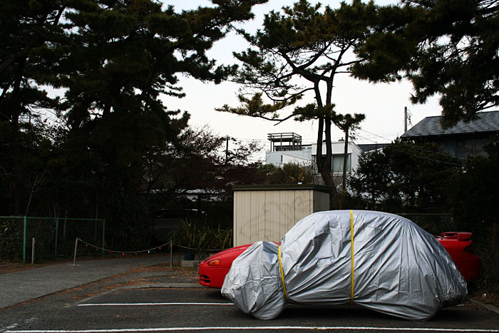 A small car, all wrapped up, in Kamakura.