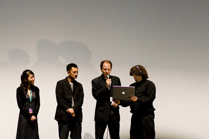 Wilson Yip and Chris Geddes on the stage for the screening of Flash Point