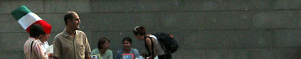 A man handing out flyers at a vigil for Zahra Kazemi